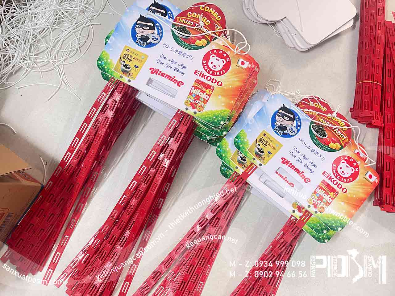 Hanger treo vỉ nhiều gói liền nhau vắt qua và móc treo gói rời trên dây nhựa - Ảnh 4